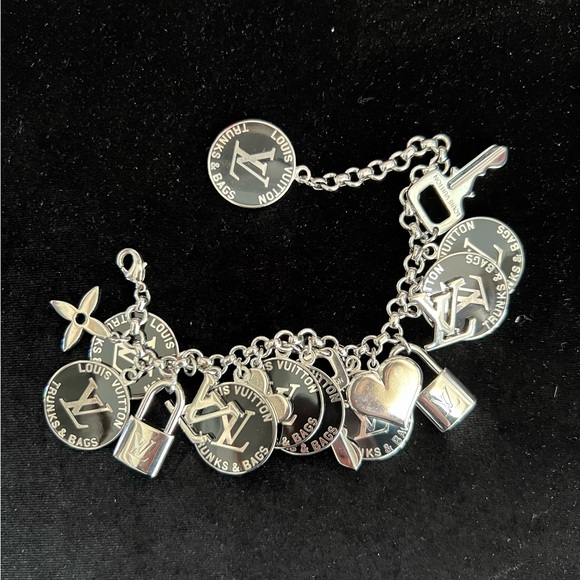 Authentic Louis Vuitton Trunks and Bags 
Multi-charm Bracelet - Picture 1 of 7